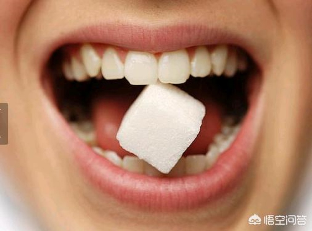 تأثير السكر الابيض على الاسنان